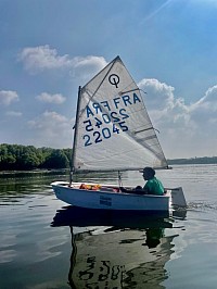 First time sailing by yourself. Sailing an Optimist. Worlds most use training sail boat.